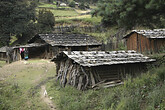 Haeuser der Yi-Volksgruppe, Fahrt Richtung Zhongdian (C) Anton Eder